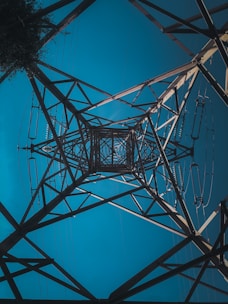 a view of the top of an electrical tower