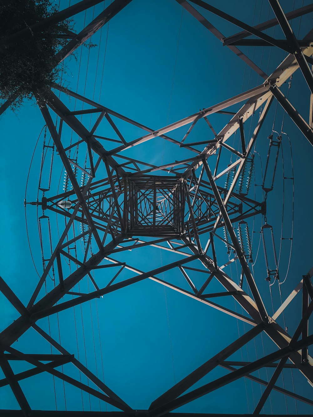 a view of the top of an electrical tower