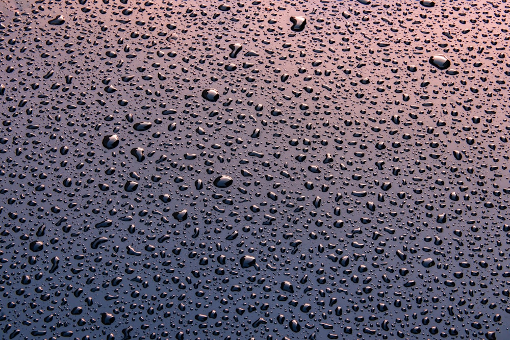 a close up of water droplets on a window