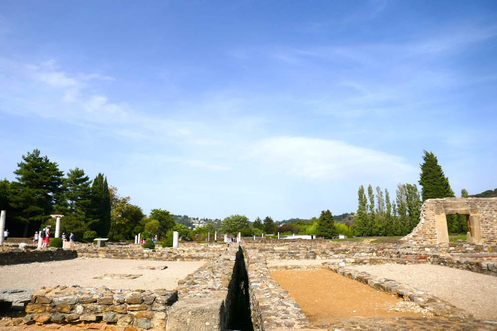 the ruins of a roman city with a sky background