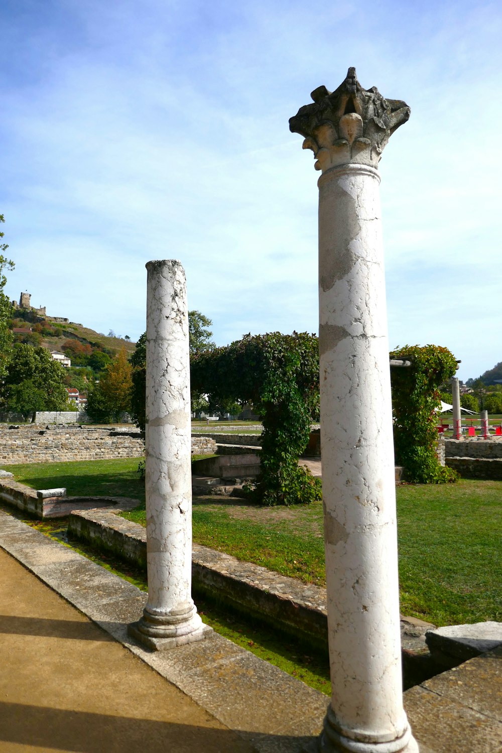 a couple of white pillars sitting next to each other