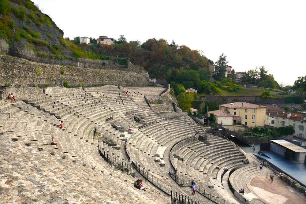 a view of a roman amphit with people walking around