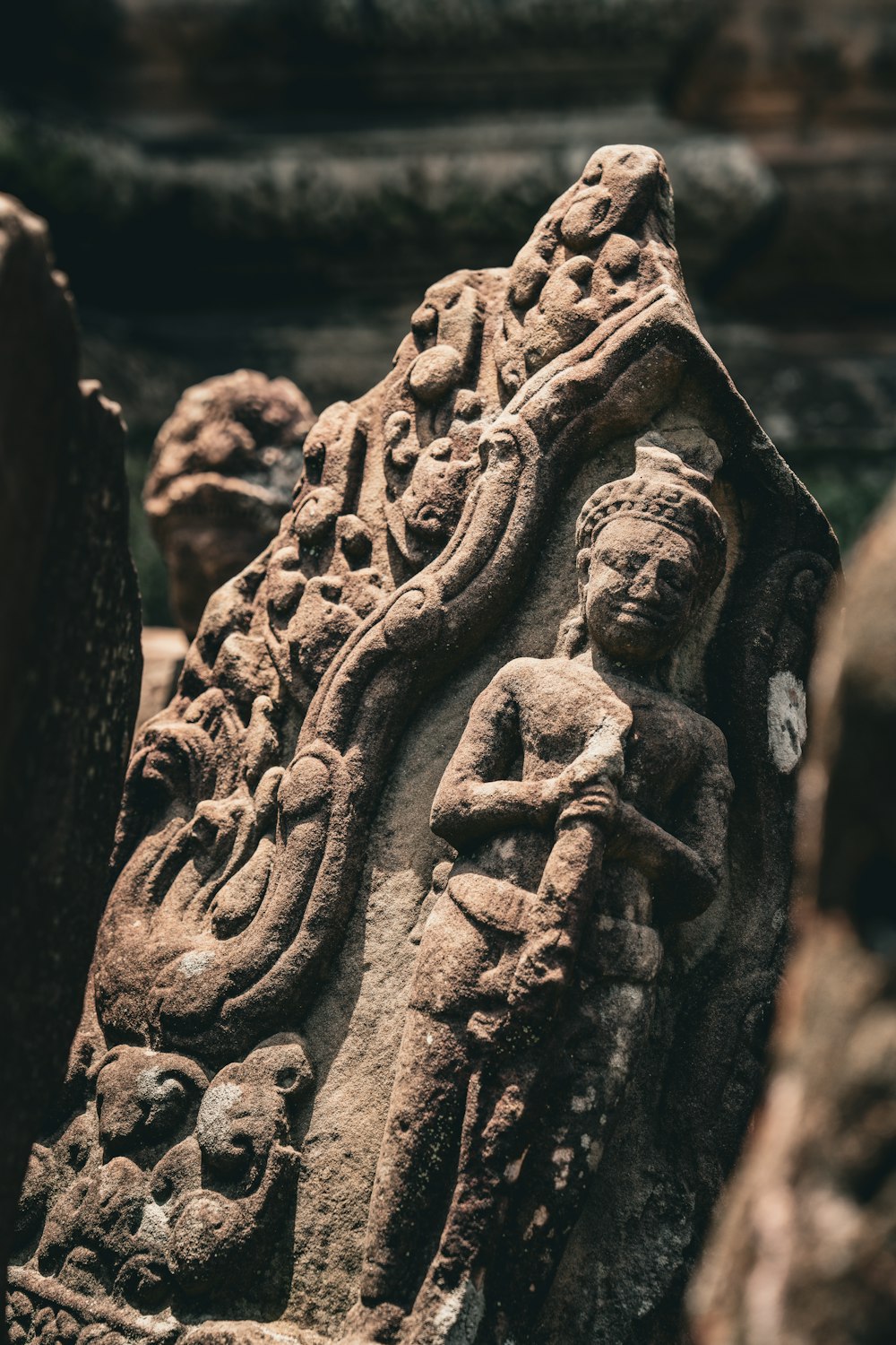 a close up of a carving on a rock