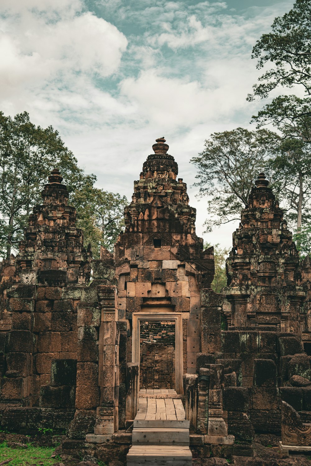 a stone structure with a doorway in the middle of it