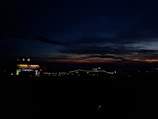An artistic shot of a sunset during an outdoor event.