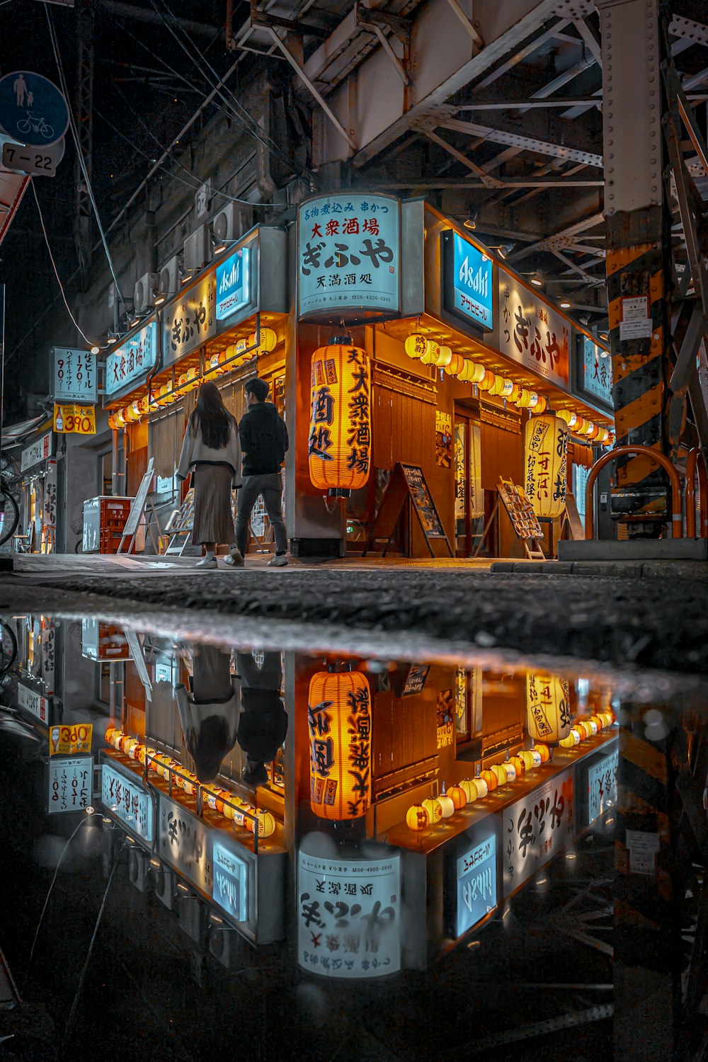 a couple of people that are standing in front of a building