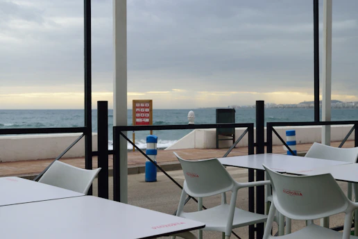 a restaurant with a view of the ocean