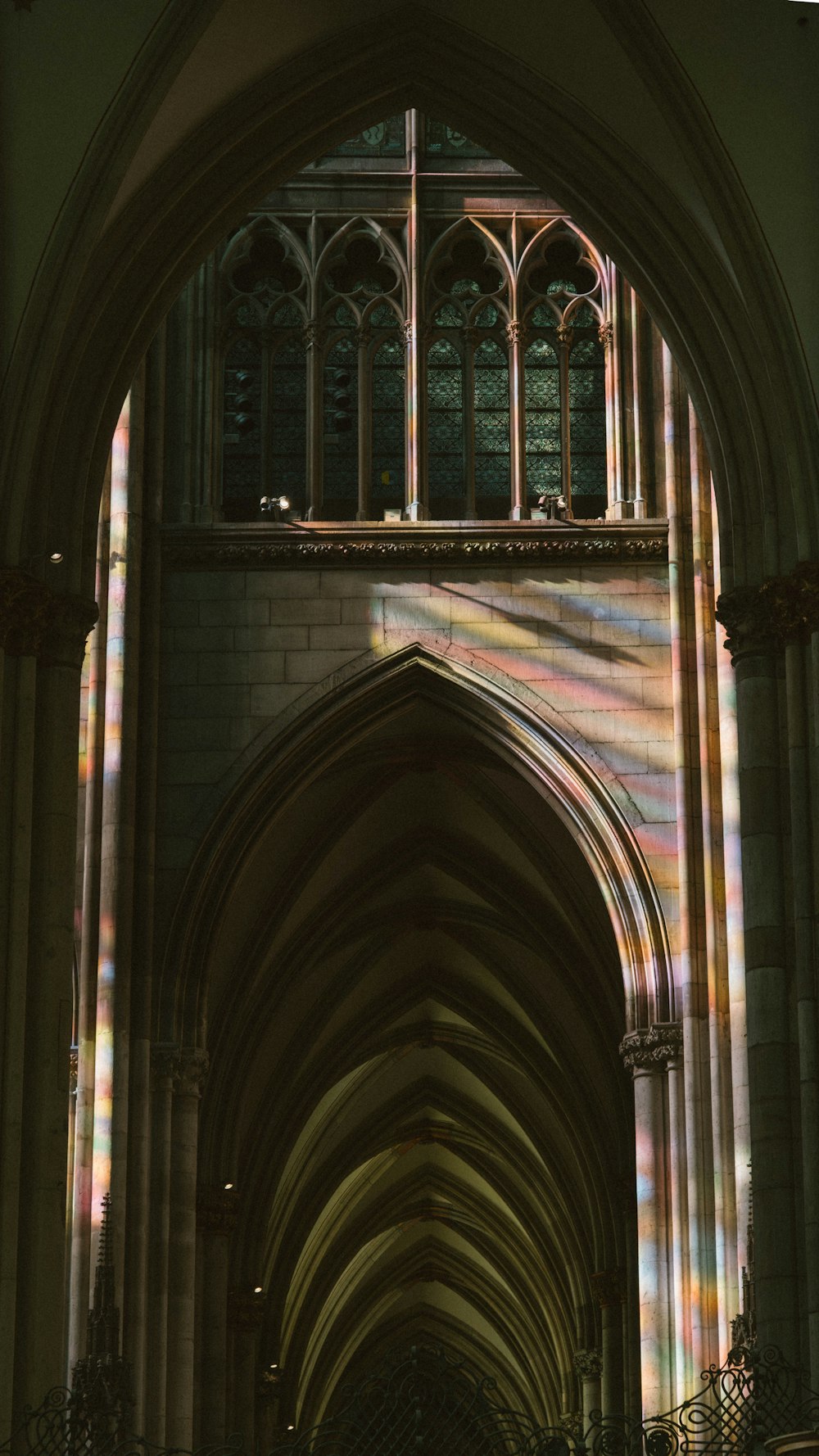 the sunlight is shining through the stained glass windows