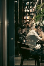 A group of students studying together in a cozy environment, highlighting collaboration and learning.