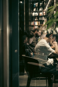 A diverse group of people studying together in a cozy setting.