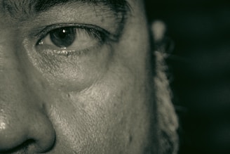 A side-by-side image of a face before and after cosmetic procedure highlighting skin improvement.