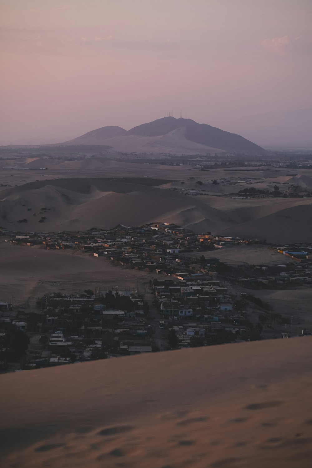 a view of a town in the middle of a desert