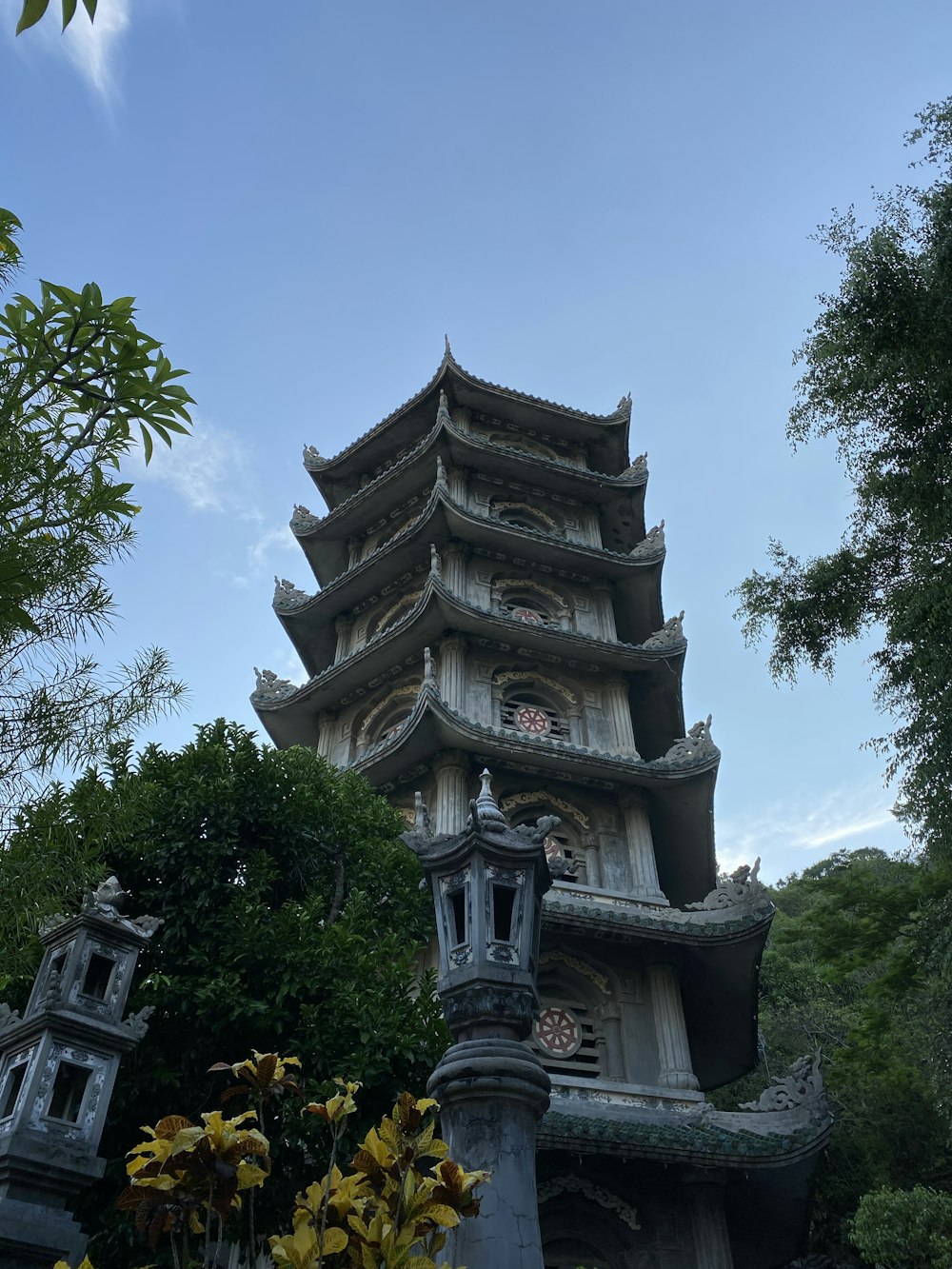 a tall tower with a clock on the top of it