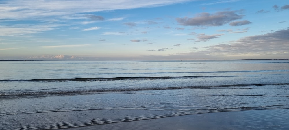 a view of the ocean from a beach