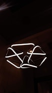An elegant LED chandelier illuminating a modern living space.