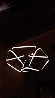A stylish chandelier illuminating a contemporary living space.