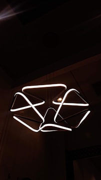 An elegant LED chandelier illuminating a modern living space.