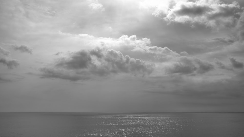 a black and white photo of the ocean