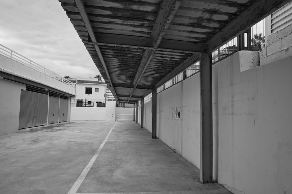a black and white photo of an empty parking lot