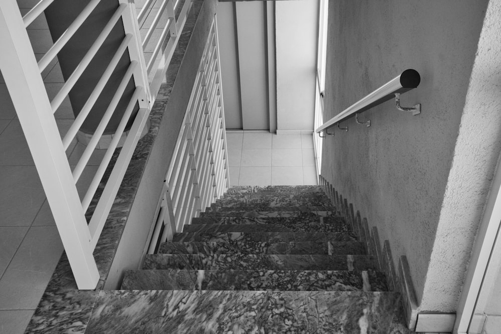 a black and white photo of a staircase