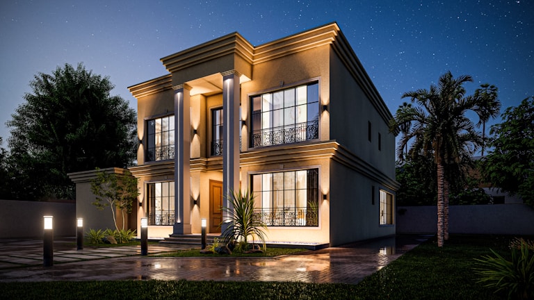 Modern luxury home exterior with navy and gold accents under soft lighting.