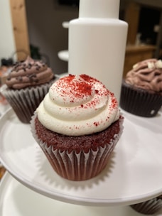 A close-up of a cupcake showcasing its rich texture and toppings.