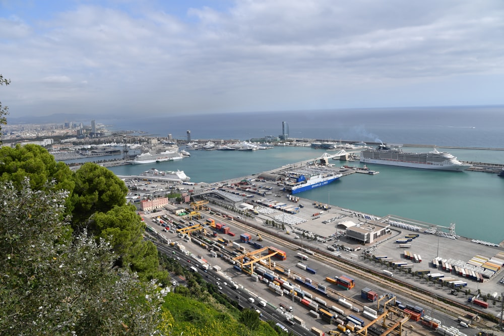 a harbor filled with lots of traffic next to a large body of water