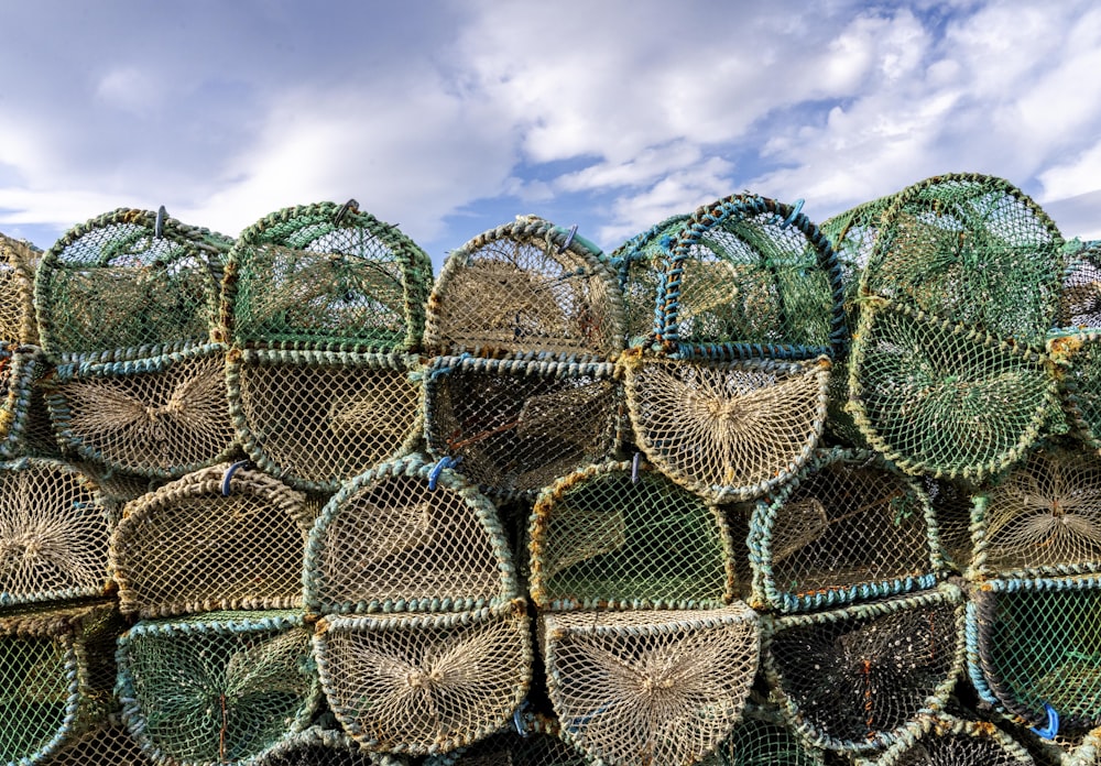 a pile of fishing nets stacked on top of each other