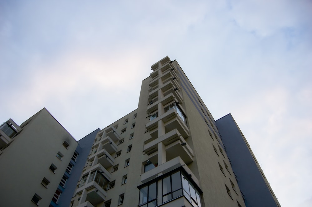 a tall building with a sky background