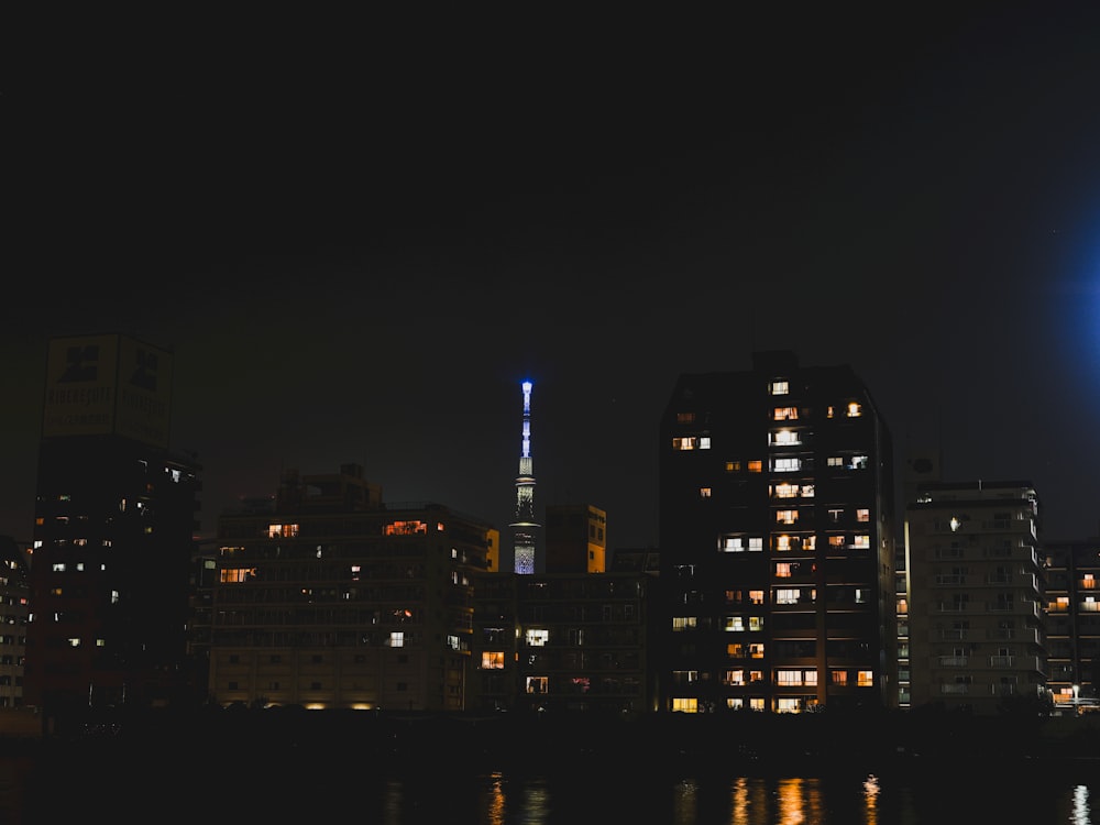 a view of a city at night from across the water