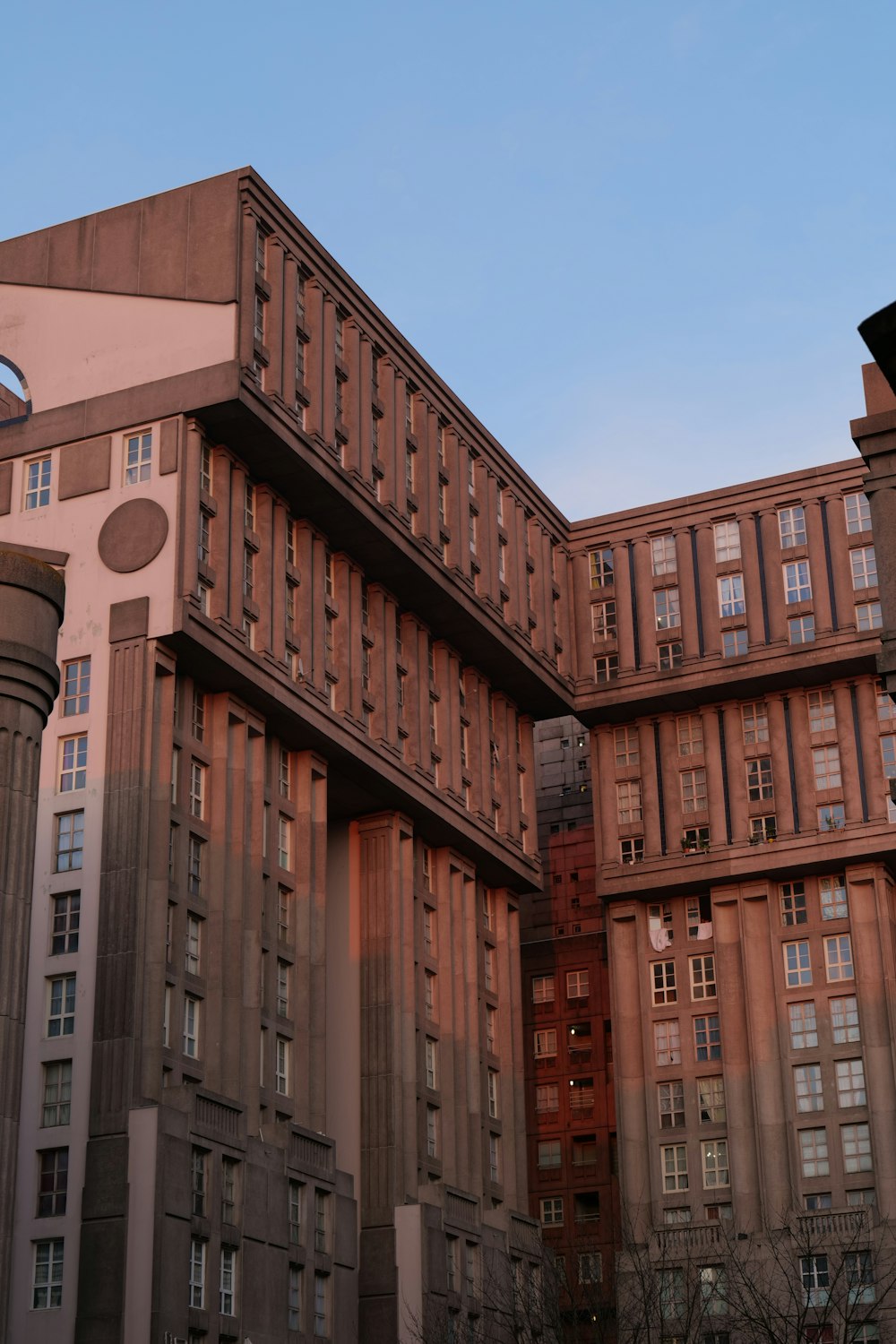 a large building with a clock on the side of it