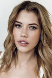 a close up of a woman with long hair