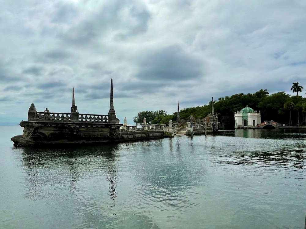 a large body of water with a bridge in the middle of it