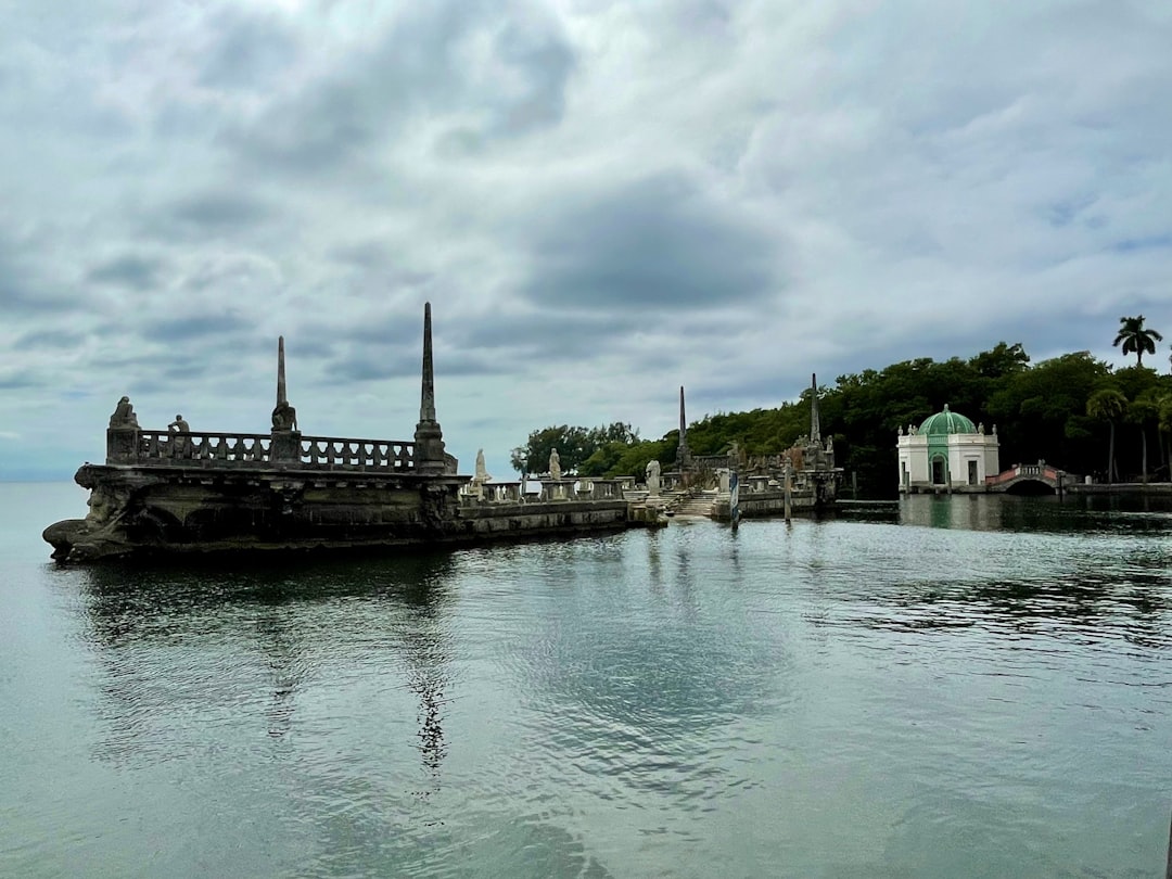 a large body of water with a bridge in the middle of it,