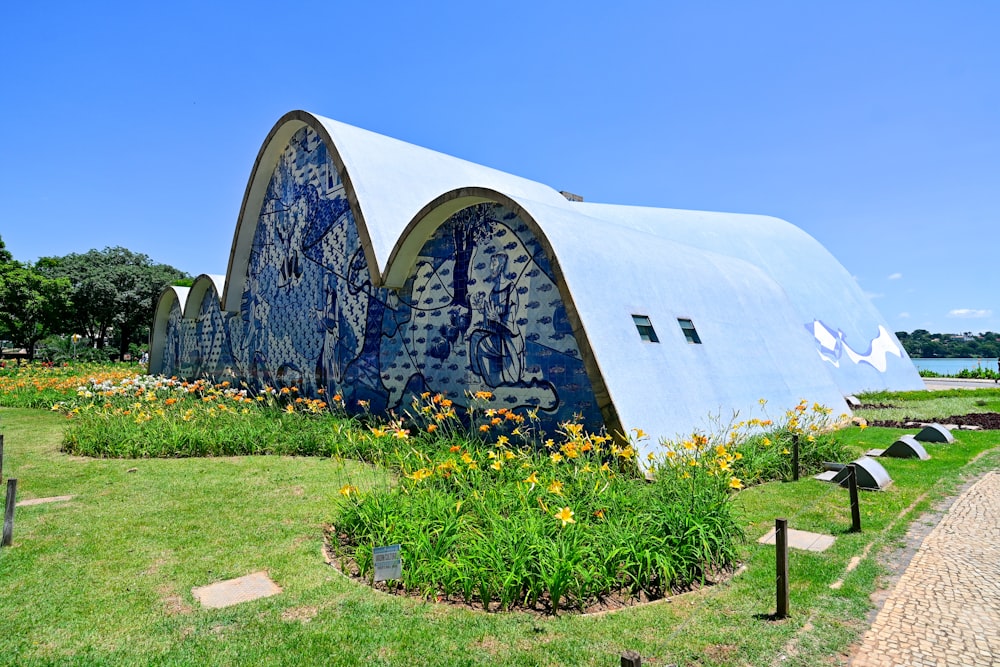 a building made out of blue and white tiles