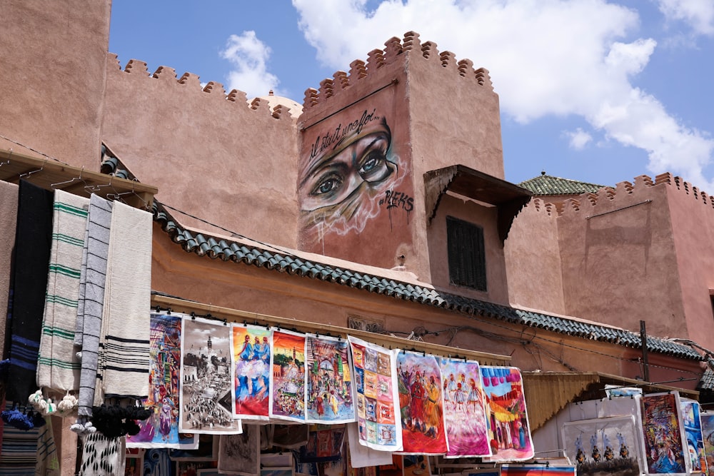 a building with a lot of posters on it