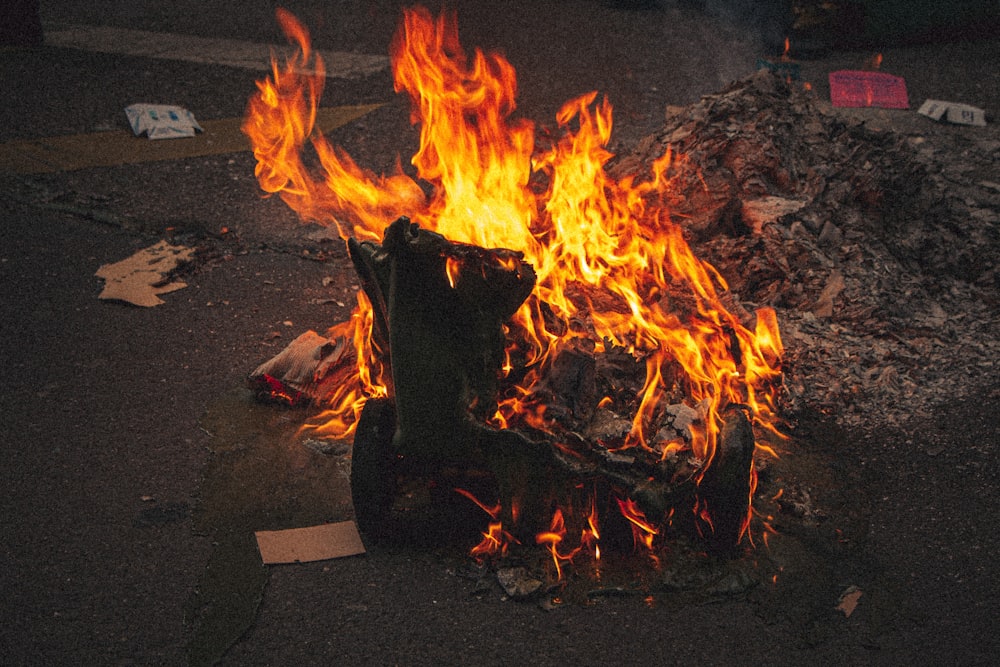 a fire burning in the middle of a street