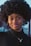 a close up of a person with an afro