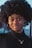 a close up of a person with an afro