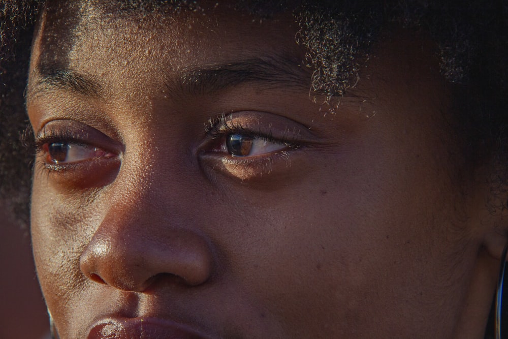 a close up of a person wearing a headset