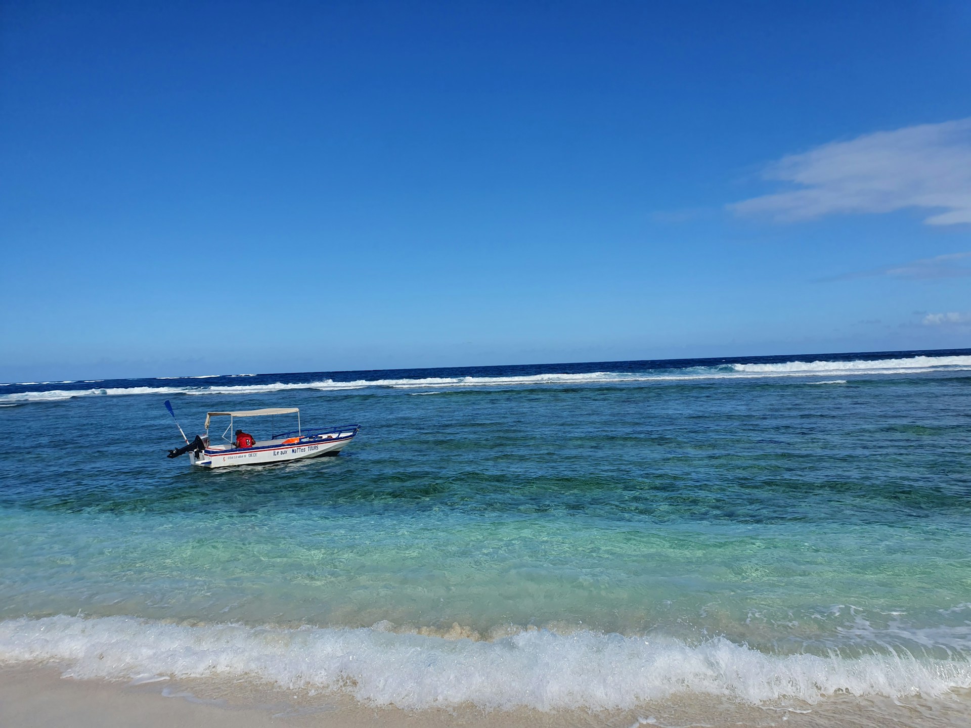 woman wearing yellow long-sleeved dress under white clouds and blue sky during daytime
