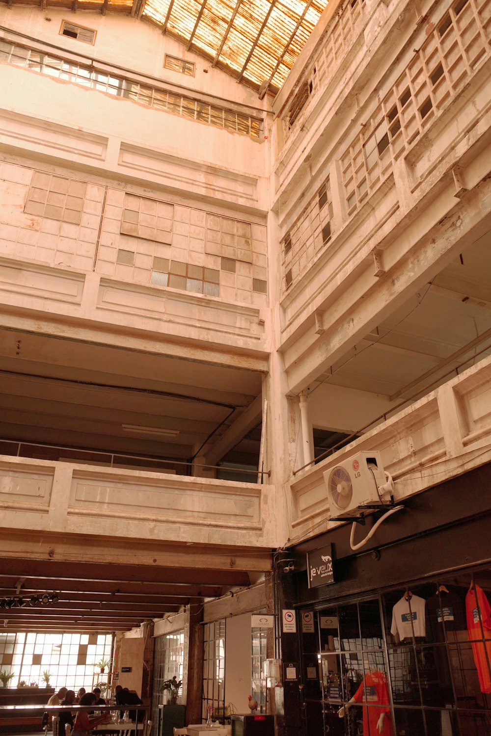 the inside of a building with a glass roof