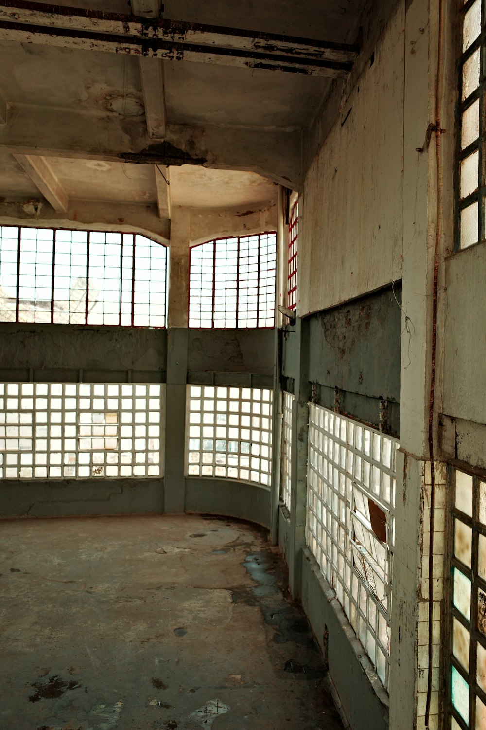 a run down building with lots of windows