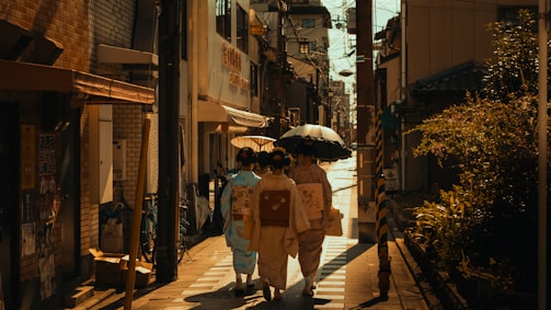 Umair leading a small group on a heritage walk through a narrow Delhi street.