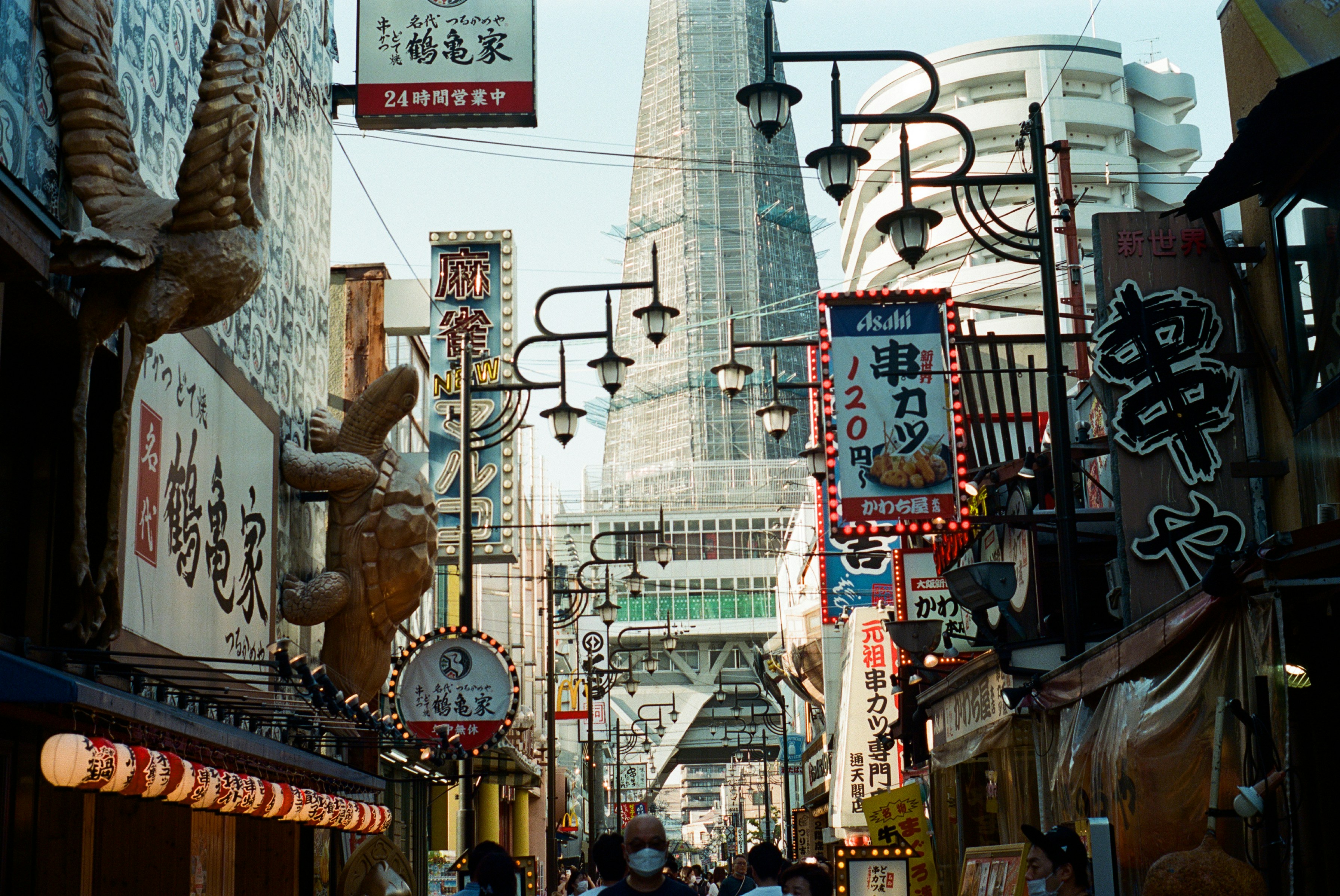 a city street filled with lots of tall buildings