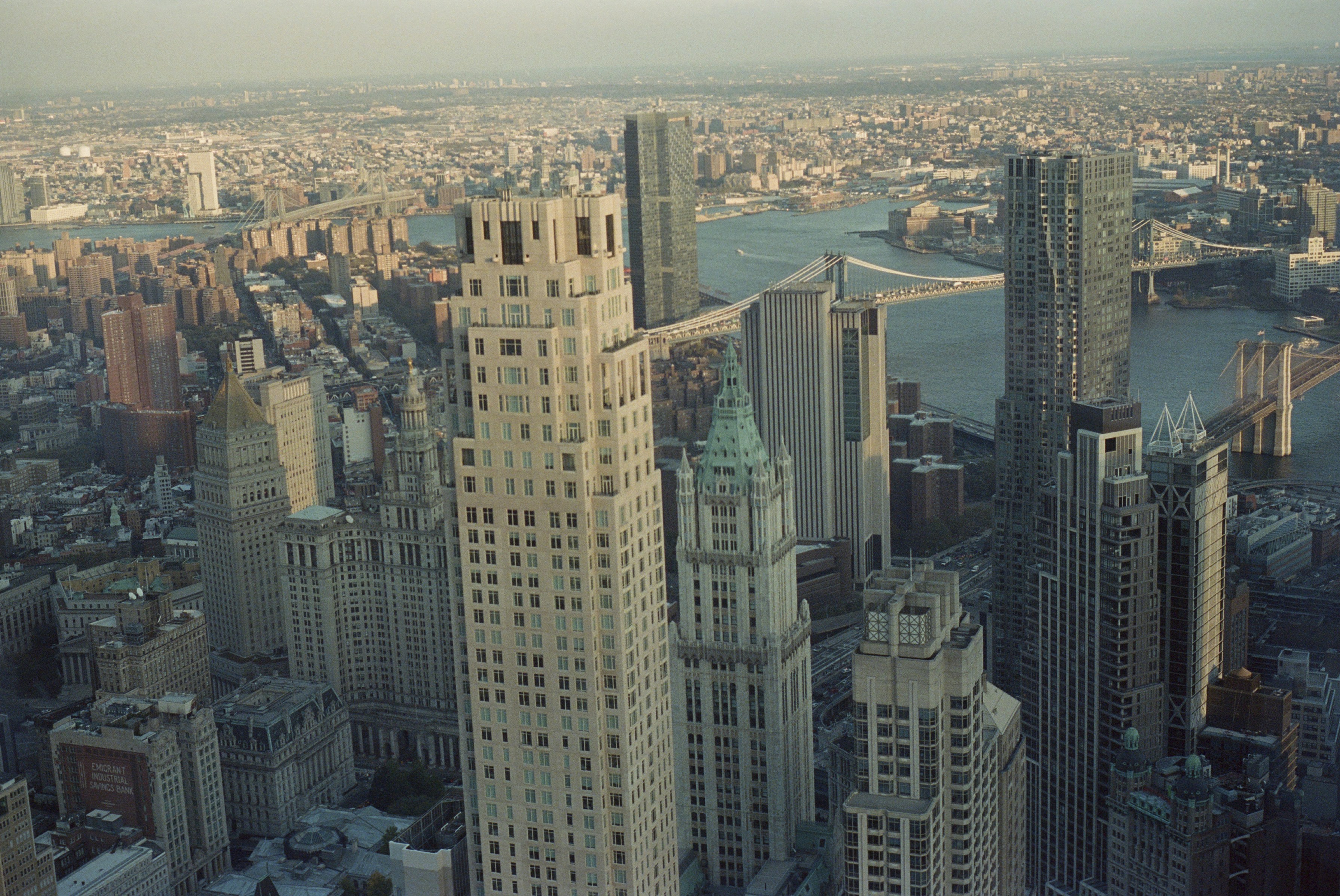 an aerial view of a city with tall buildings