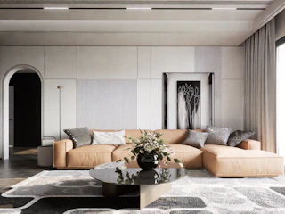 a living room with a couch and a table