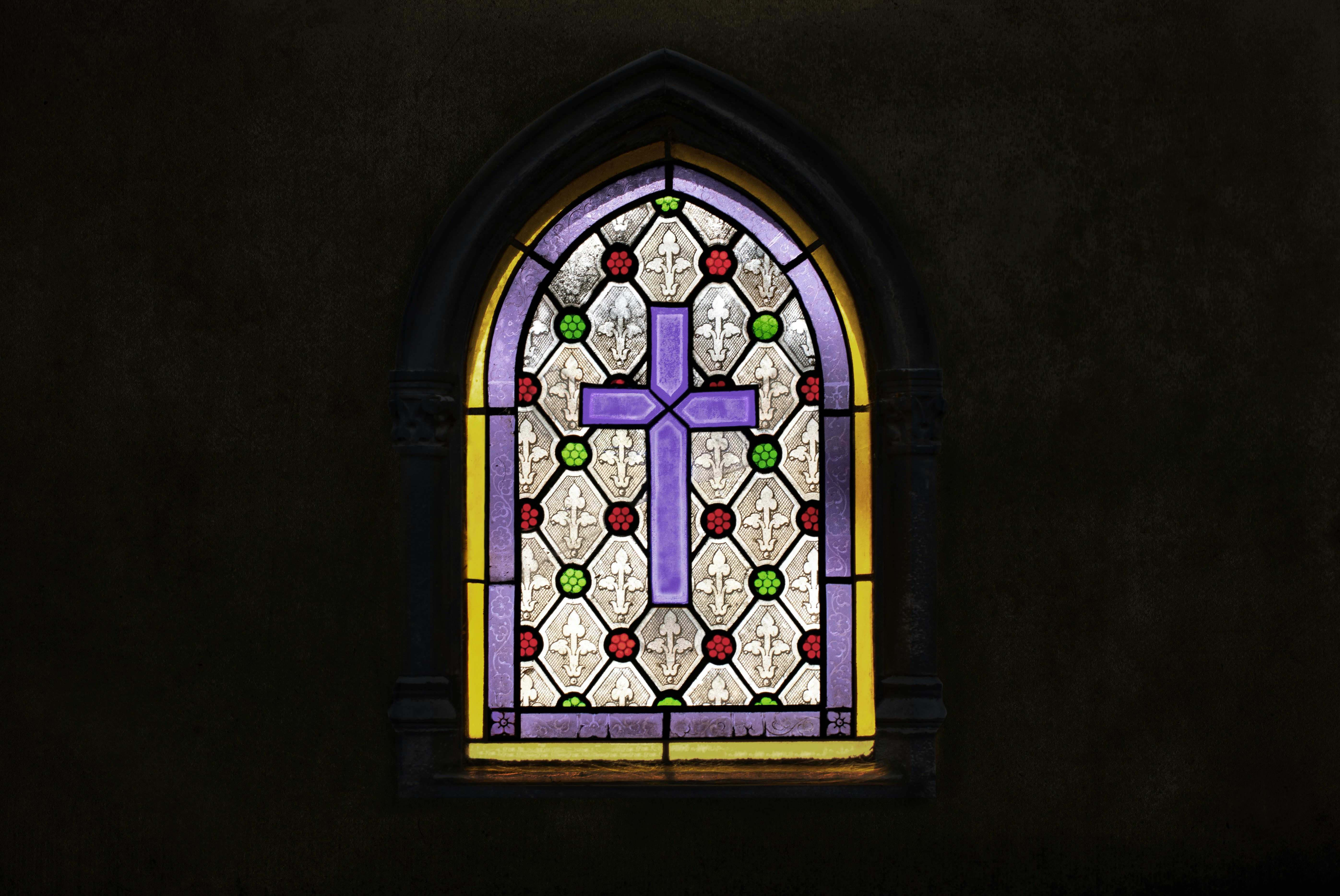 beautiful stained-glass window, representing unique church property - church insurance claim process