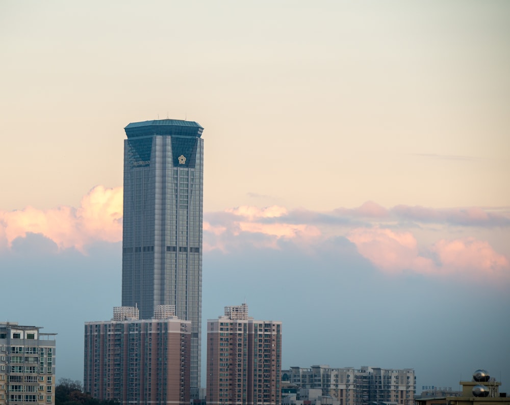 a tall building with a clock on the top of it