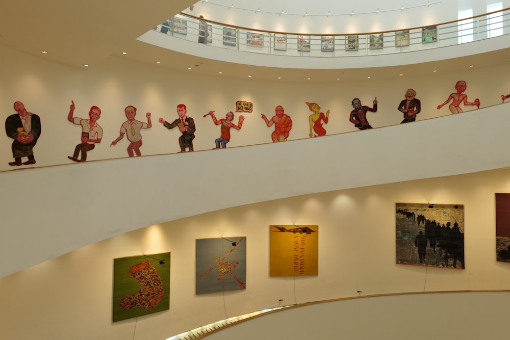 a group of people standing on top of a spiral staircase